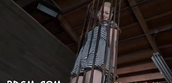 Caged up beauty is coercive to give guy wild cock sucking